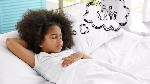 Cute little girl dreaming of happy family. Adoption, custody and childcare concept.